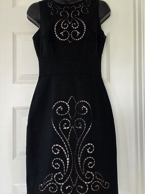 Maggy London Black Sleeveless Midi Dress with Laser-Cut Scroll Details